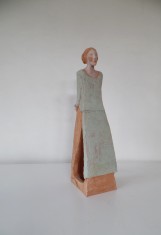 Figura con grembiule